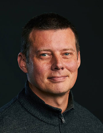 A headshot of Dr Torsten Gaebel, a Postdoctoral Research Associate in the Quantum Nanoscience Laboratory