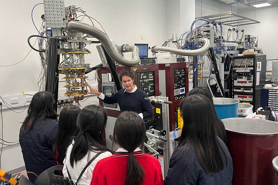 Prof David Reilly explains how a dilution refrigerator works to students in the Quantum Nanoscience Laboratory