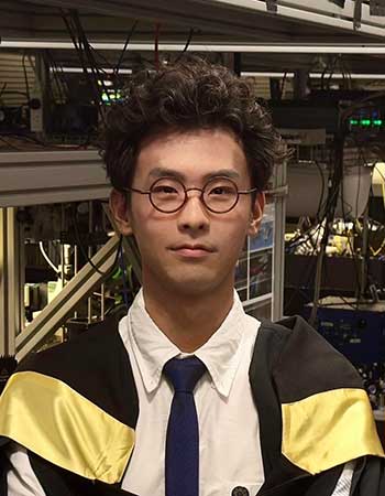 Professional headshot of Grant Chang PhD candidate in Quantim Control Lab