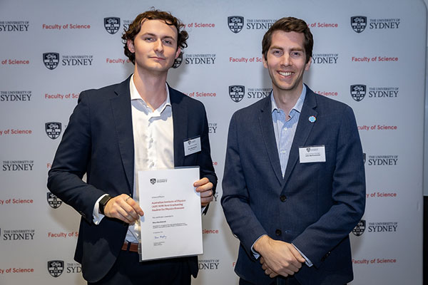 Honours graduate Rhys Mackintosh (left), pictured with Dr John Bartholomew, received three awards at the recent School of Physics Prize Night.