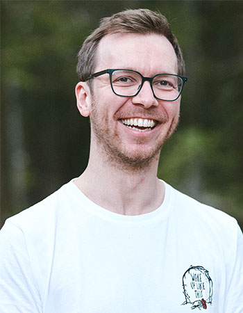A headshot of Dr Timo Hillman, Postdoctoral Research Associate in the Quantum Theory Group